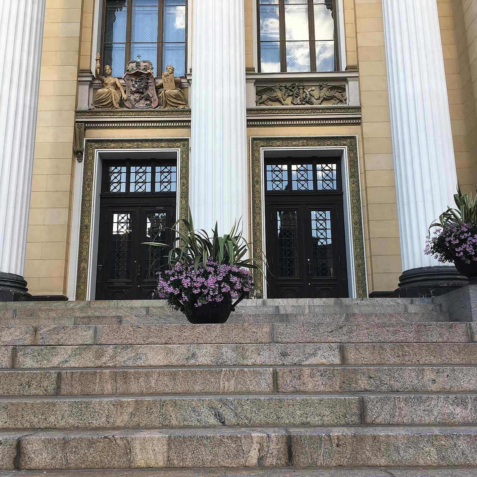 The grand entrance stairs lead into the building’s ceremonial core, where the interiors were designed to impress visiting representatives.