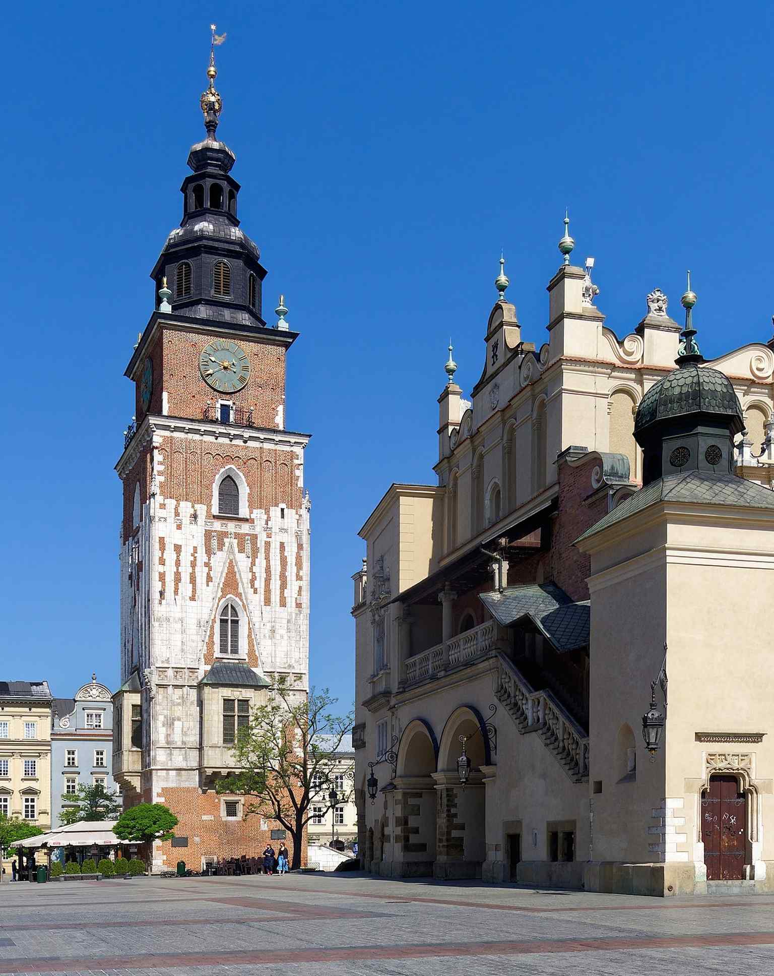 Ein Plakat aus der Kriegszeit mit dem Turm, das zeigt, wie das Denkmal in der Bildsprache des 20. Jahrhunderts als Symbol für Krakau verwendet wurde.