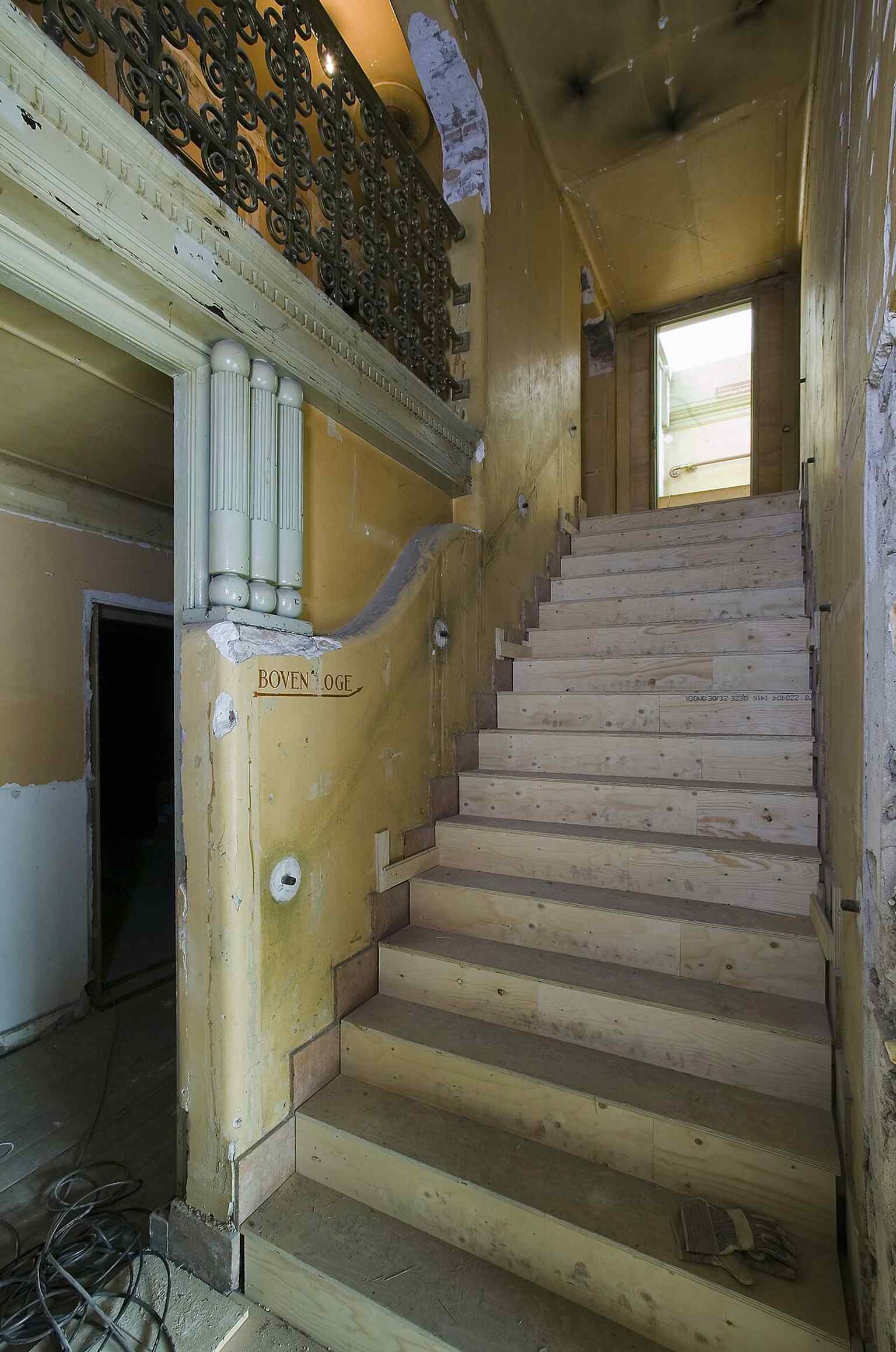 The staircase to the foyer captures the building’s elegant theatrical atmosphere from the cinema era.