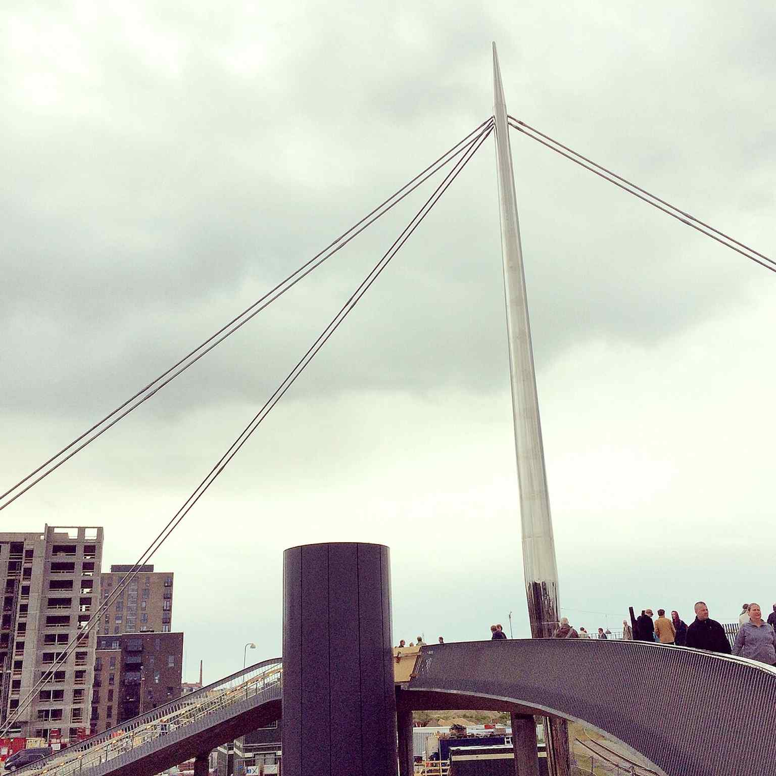 The bridge at its opening with the pylon visible — a key part of the 40-meter steel landmark that spans 15 railway tracks.