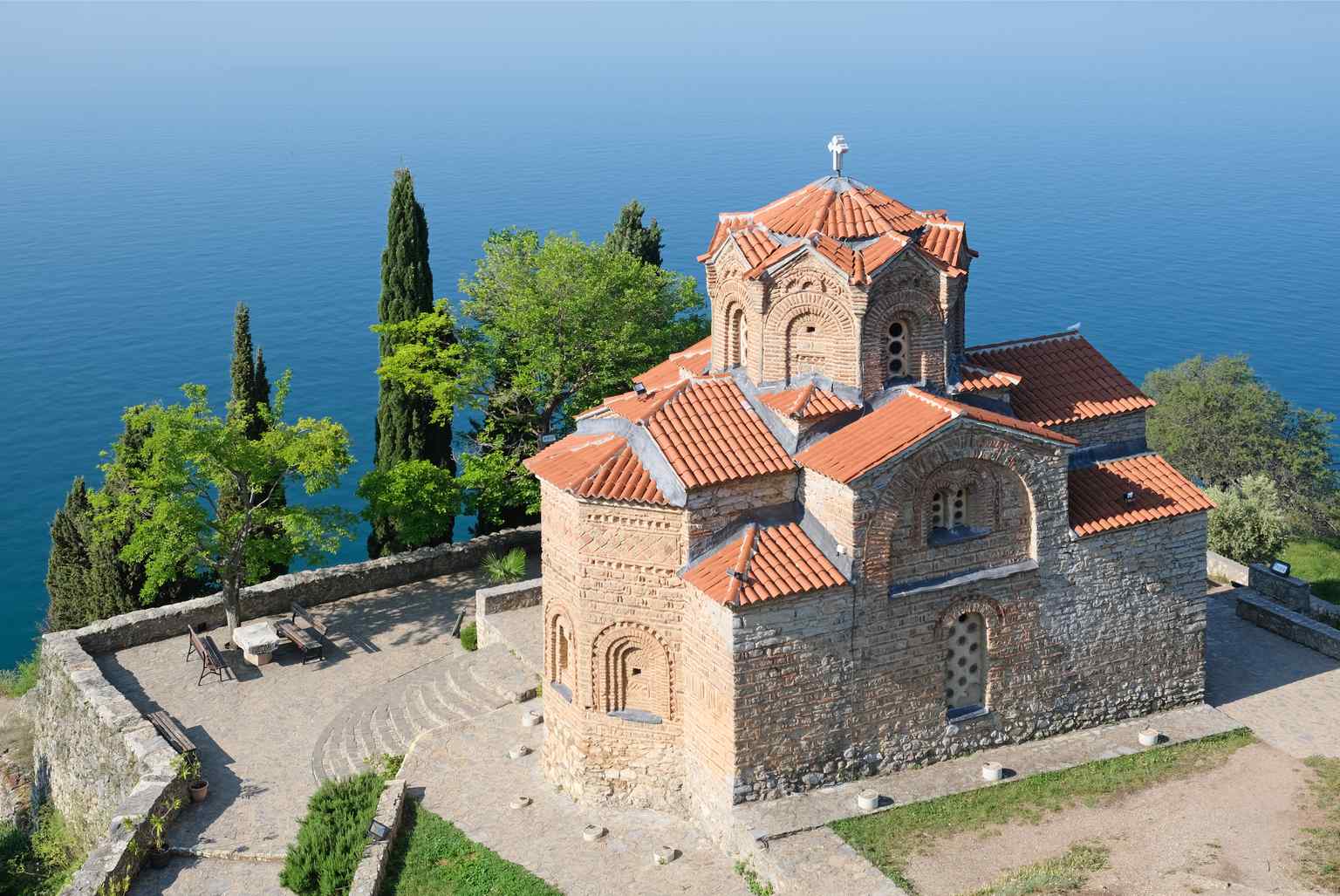 This iconic view of St. John Kaneo, perched dramatically above Lake Ohrid, gained worldwide recognition as a key location in the Oscar-nominated film "Before the Rain".