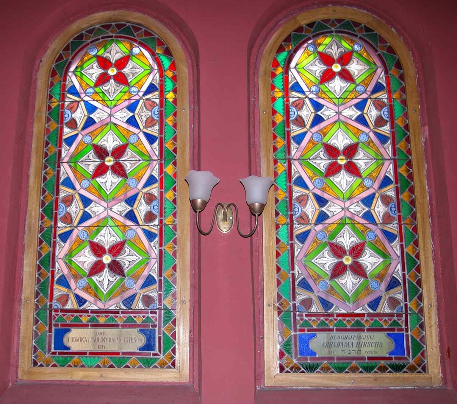 One of Tempel’s colorful stained-glass windows, part of the decorative interior that survived later renovations and restoration.