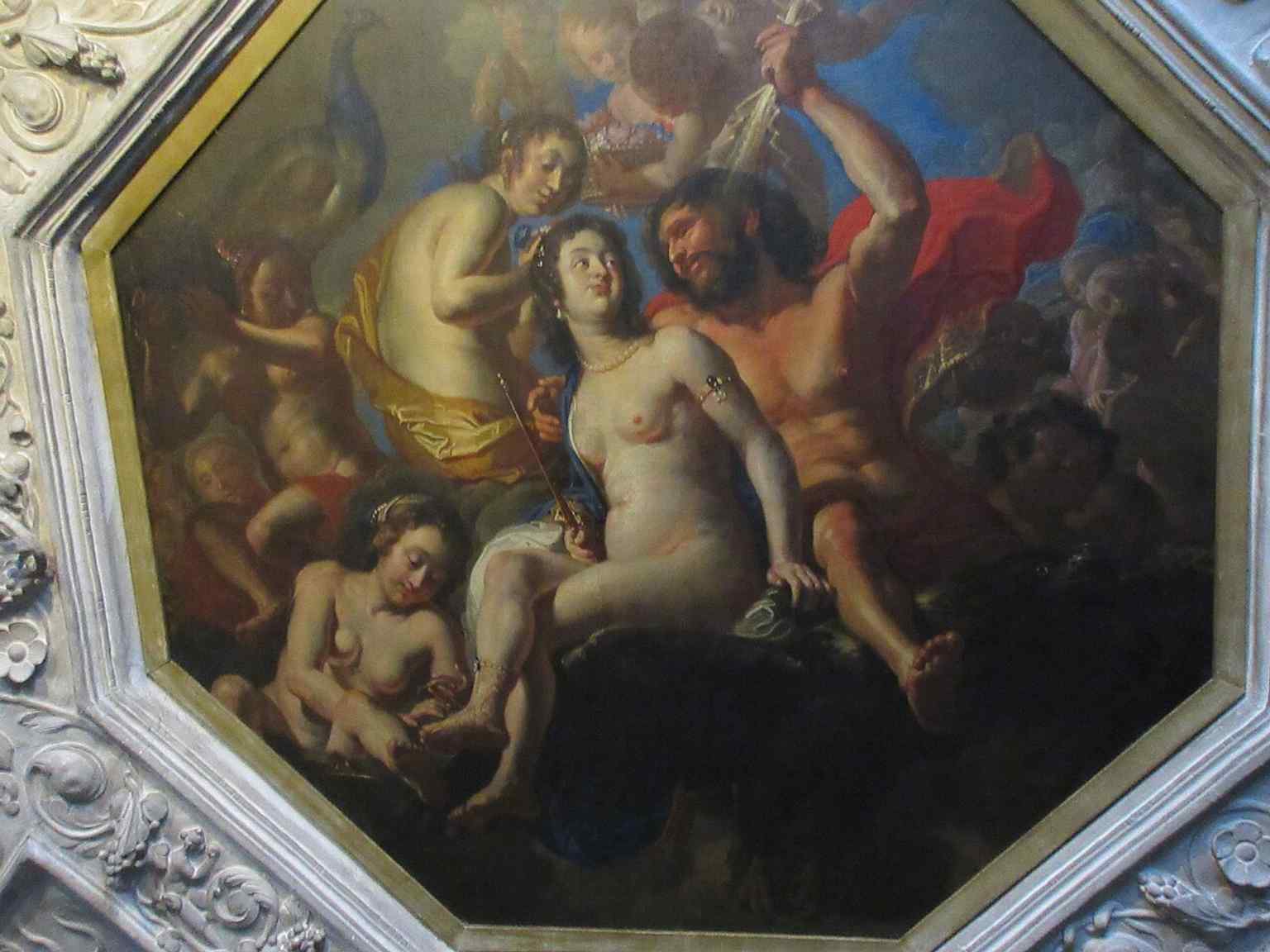 The ornate ceiling painting 'Hera and Zeus on Olympus' by Abraham Wuchters from the 1660s, believed to feature Queen Sophie Amalie, is one of Rosenborg's well-preserved interior artworks.