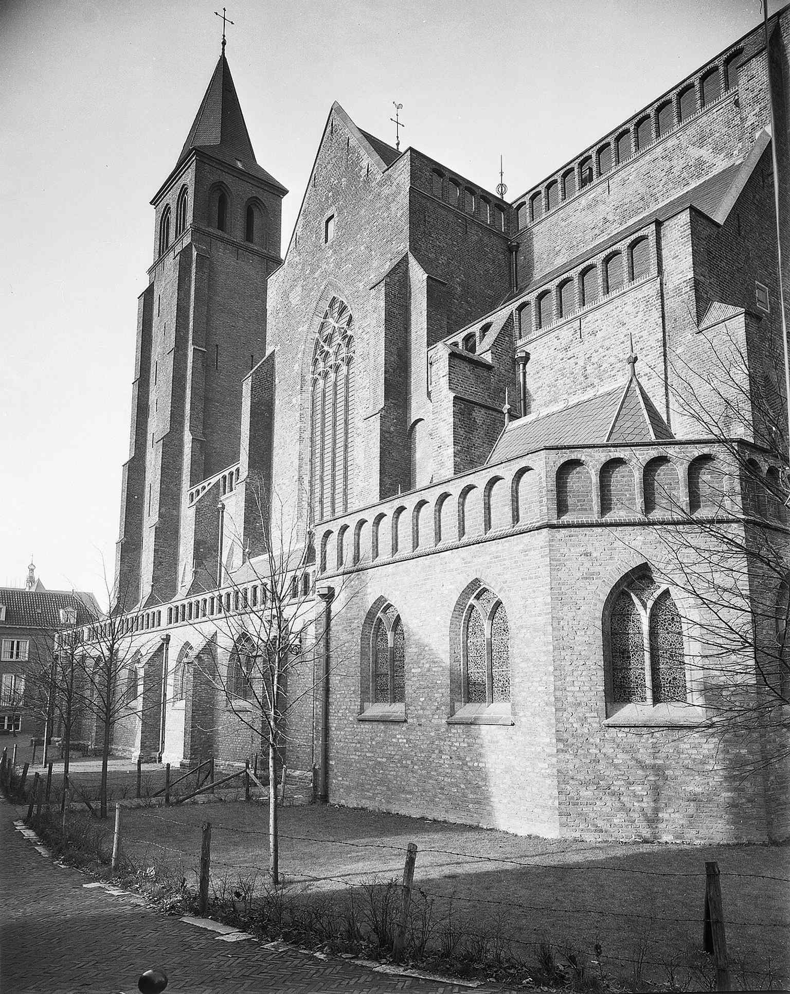 South-side exterior view that shows the later additions and the church’s long, layered architectural history.