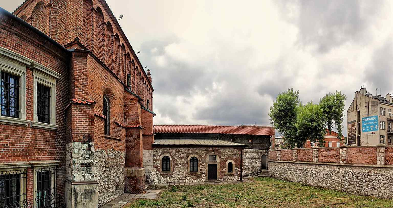 The building seen in context on Szeroka Street, where the Old Synagogue became the heart of Kazimierz after Kraków’s Jews were forced out of the Old Town.