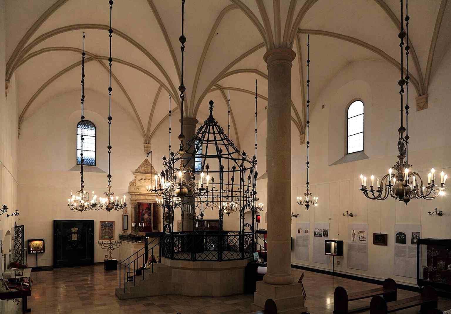 The men’s main hall, with the text’s history in mind: the building was used as a warehouse during the war and later restored as a Jewish museum.