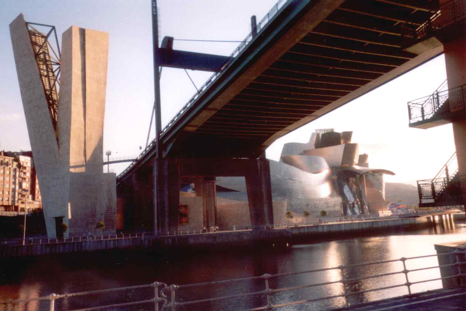 Classic exterior view with the La Salve bridge nearby, echoing the museum’s integration into the city’s industrial riverfront.