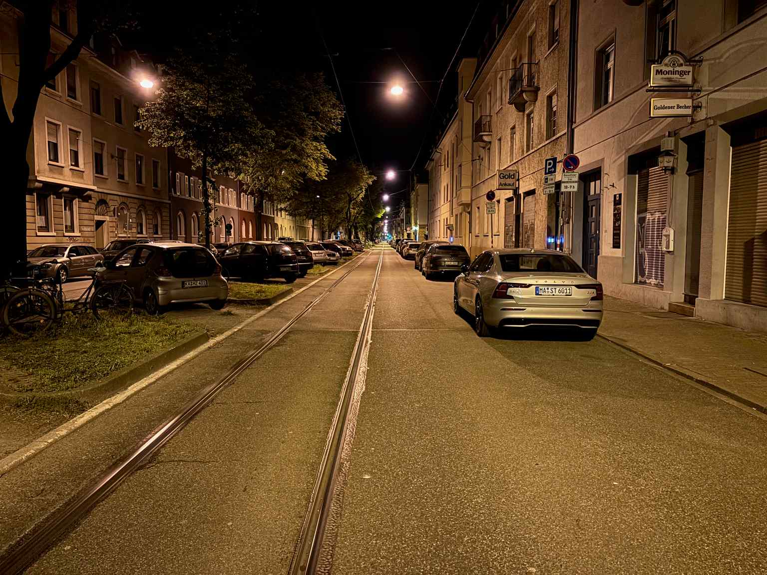 A night view of Kriegsstraße in the Weststadt in 2024, emphasizing its role as a major east-west traffic artery and part of Bundesstraße 10, a function it has held since its creation around 1800 to protect Karlsruhe's population.