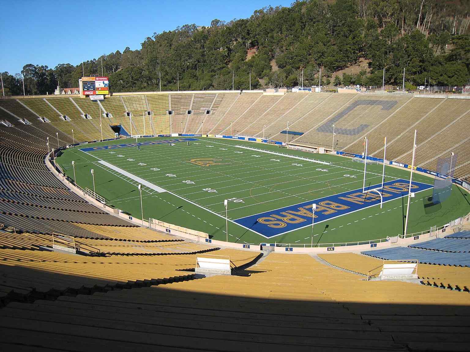 A straightforward exterior view of California Memorial Stadium before the renovation, useful for showing the classic bowl shape and canyon backdrop.