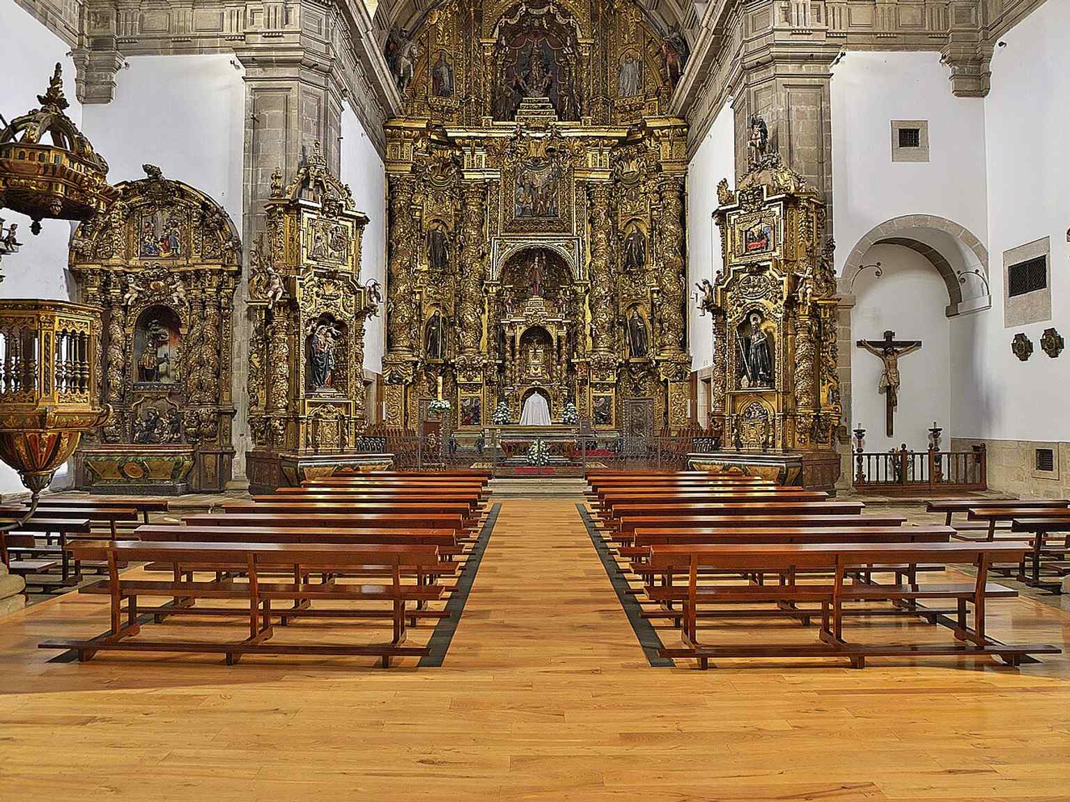 Admire the Baroque splendor of the monastery church's interior, designed by Fray Gabriel de Casas and completed in the early 18th century, a testament to the wealth brought by aristocratic nuns.