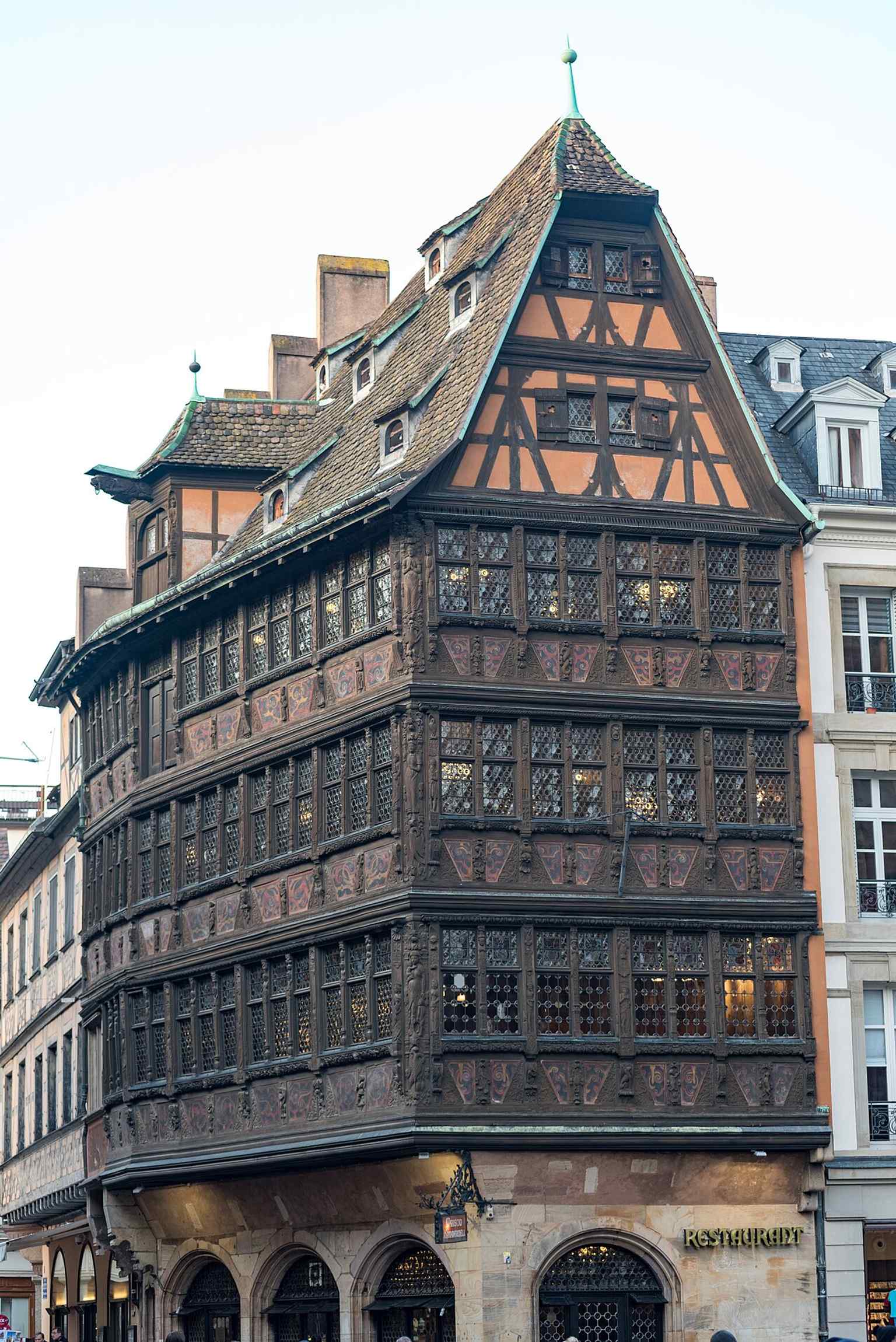 A recent street-level view of 16 Place de la Cathédrale, showing the building still standing in active use beside the cathedral.