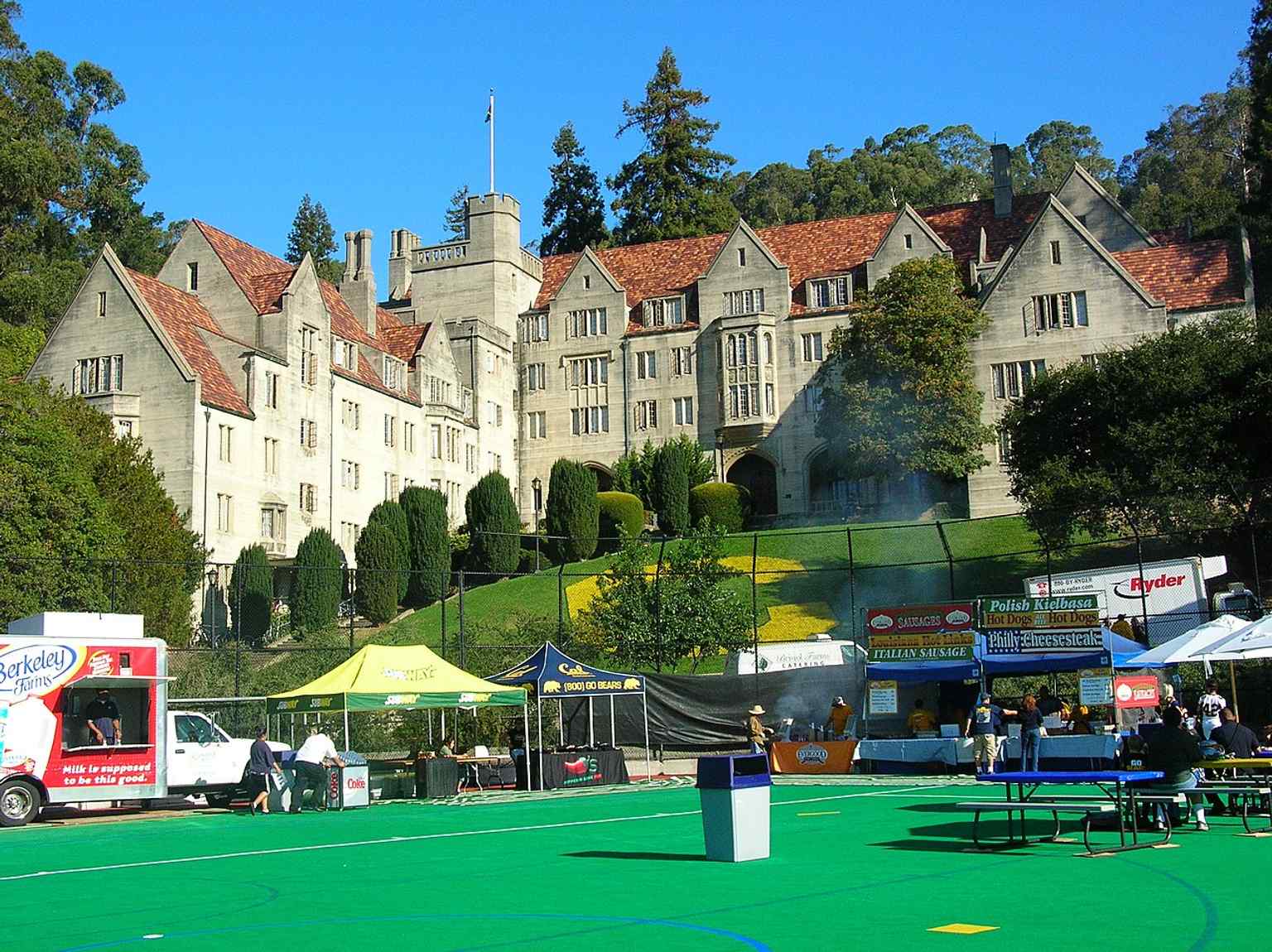 Bowles Hall viewed from Maxwell Family Field, showing its landmark tower and the campus setting beside Memorial Stadium.