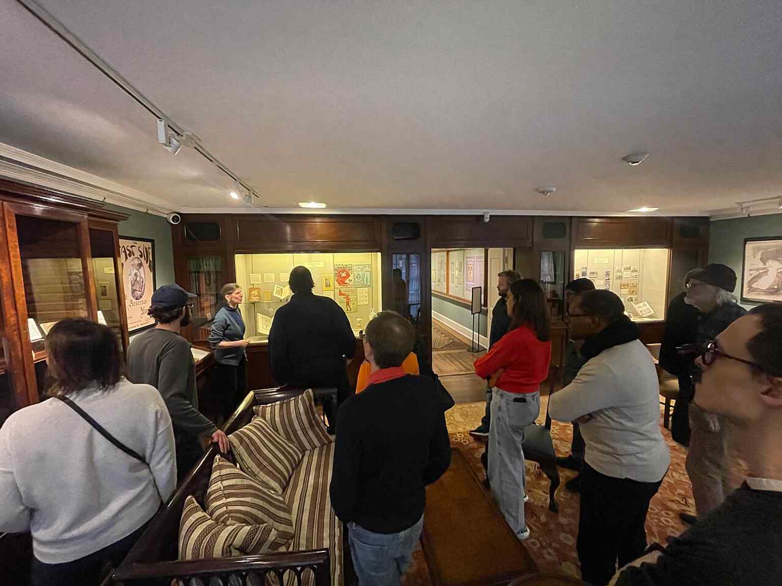 A second-floor gallery view during an exhibition, reflecting the club’s long tradition of showing books and prints as display-worthy works of art.