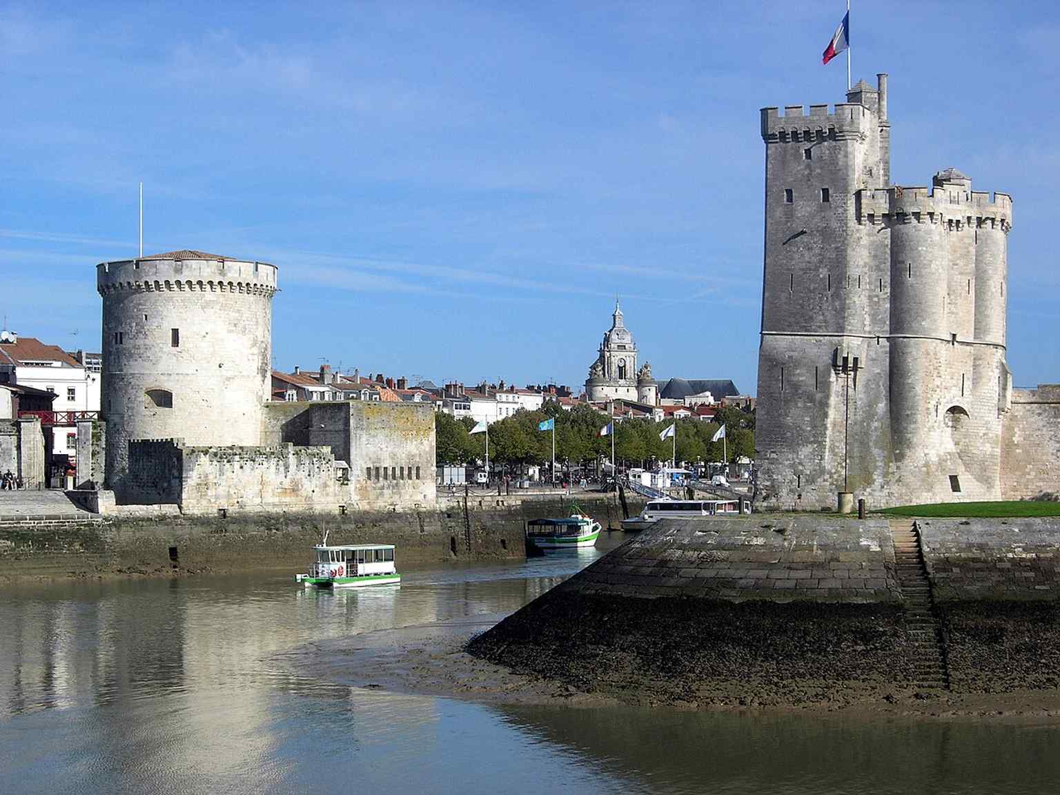 The gateway to the Old Port, with the historic Grosse Horloge nearby—this is the medieval waterfront entrance at the heart of La Rochelle’s maritime heritage.