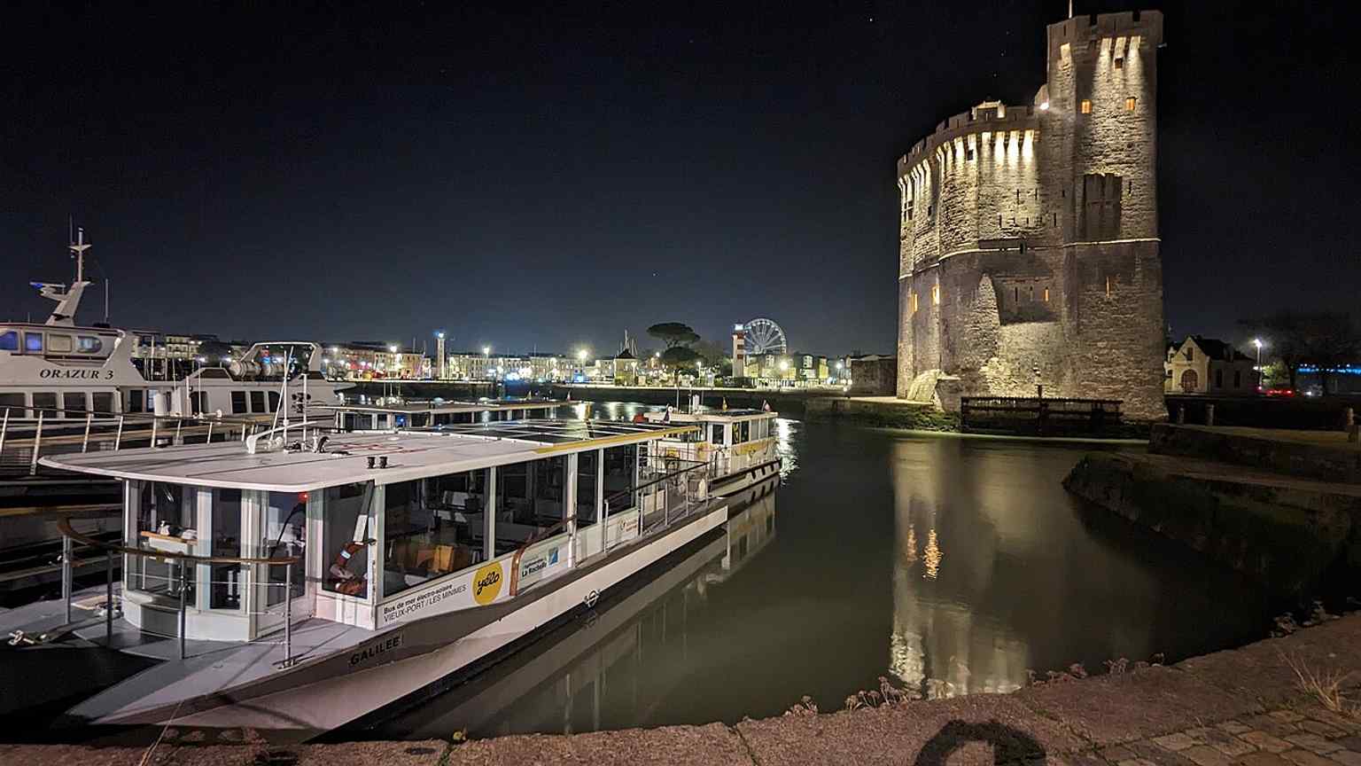 The alignment lighthouses of La Rochelle mark the harbor approach, echoing the port’s long-running need to guide ships safely into the Old Port channel.