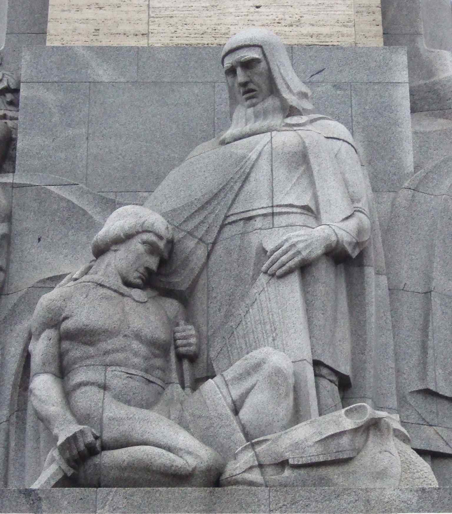 The ‘Vaidelotis’ figure group, reflecting the monument’s use of historical and mythic imagery drawn from Latvian identity.