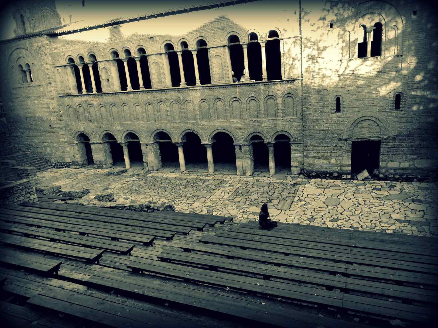 This image captures the exterior of the Church of St. Sophia in Ohrid, one of the largest and most significant medieval churches in the region, known for its unique architecture and historical importance, once serving as the Archbischopric's see.