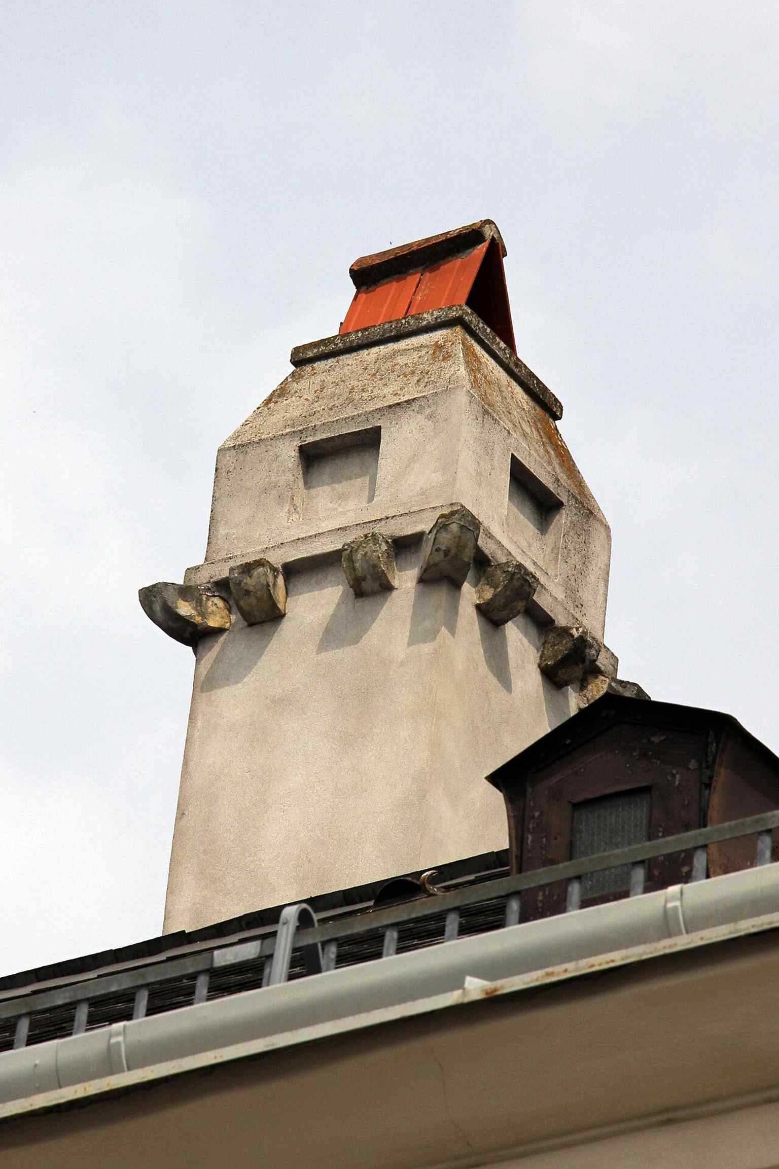 The roofline, chimney, and dormer of the Wertheimerhaus, reflecting the long-preserved fabric of the historic building.