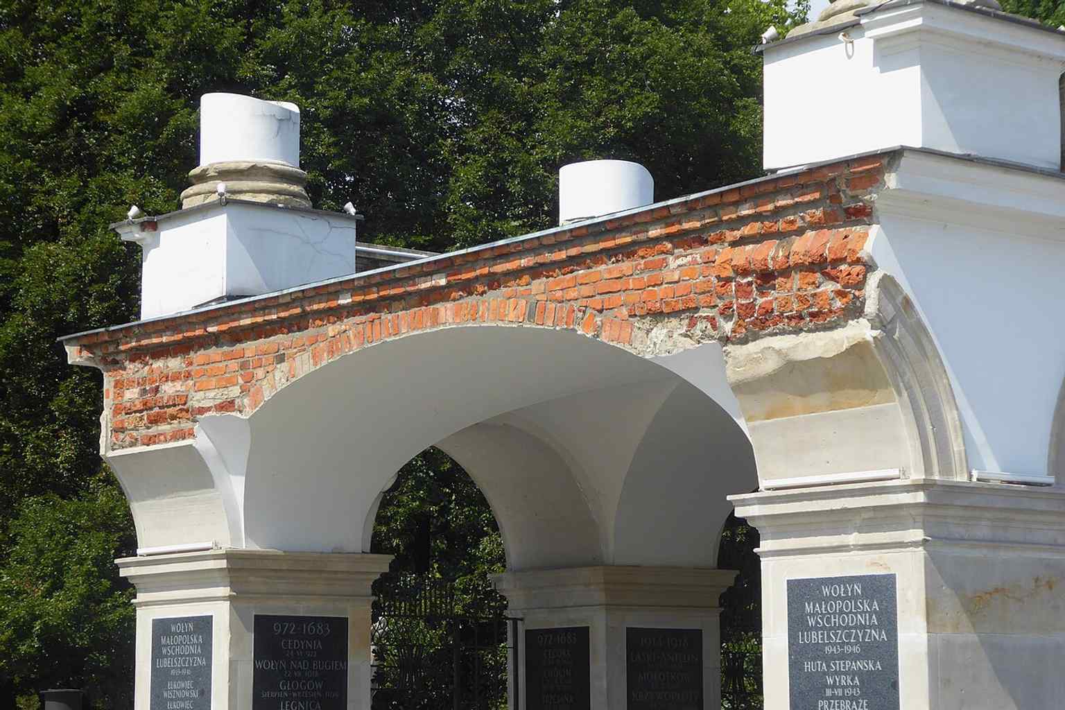 The southern side detail where the original brickwork is visible — a reminder that the tomb is the preserved remnant of a much larger palace structure.