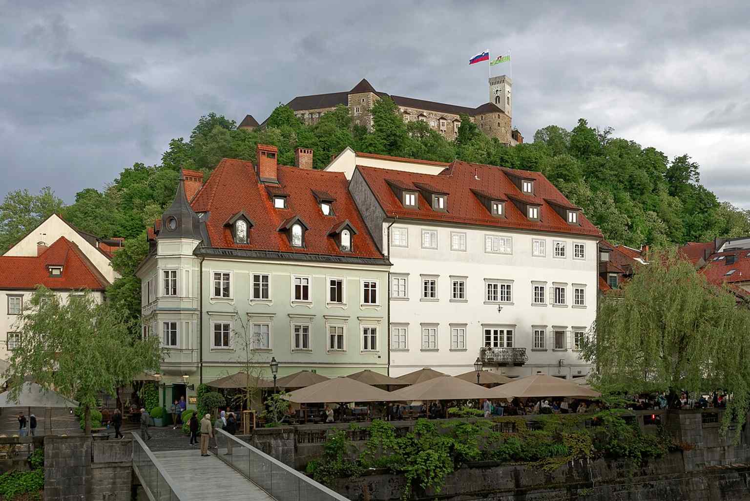 A commanding view of Ljubljana Castle, a landmark that acquired its present outline through an almost complete overhaul in the 15th century and serves as the capital's key cultural venue today.