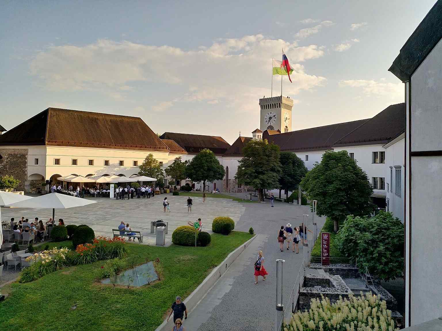 The castle's inner courtyard, a dynamic meeting point that once gathered armies and later served as a walking space for famous prisoners like Silvio Pellico and Ivan Cankar.