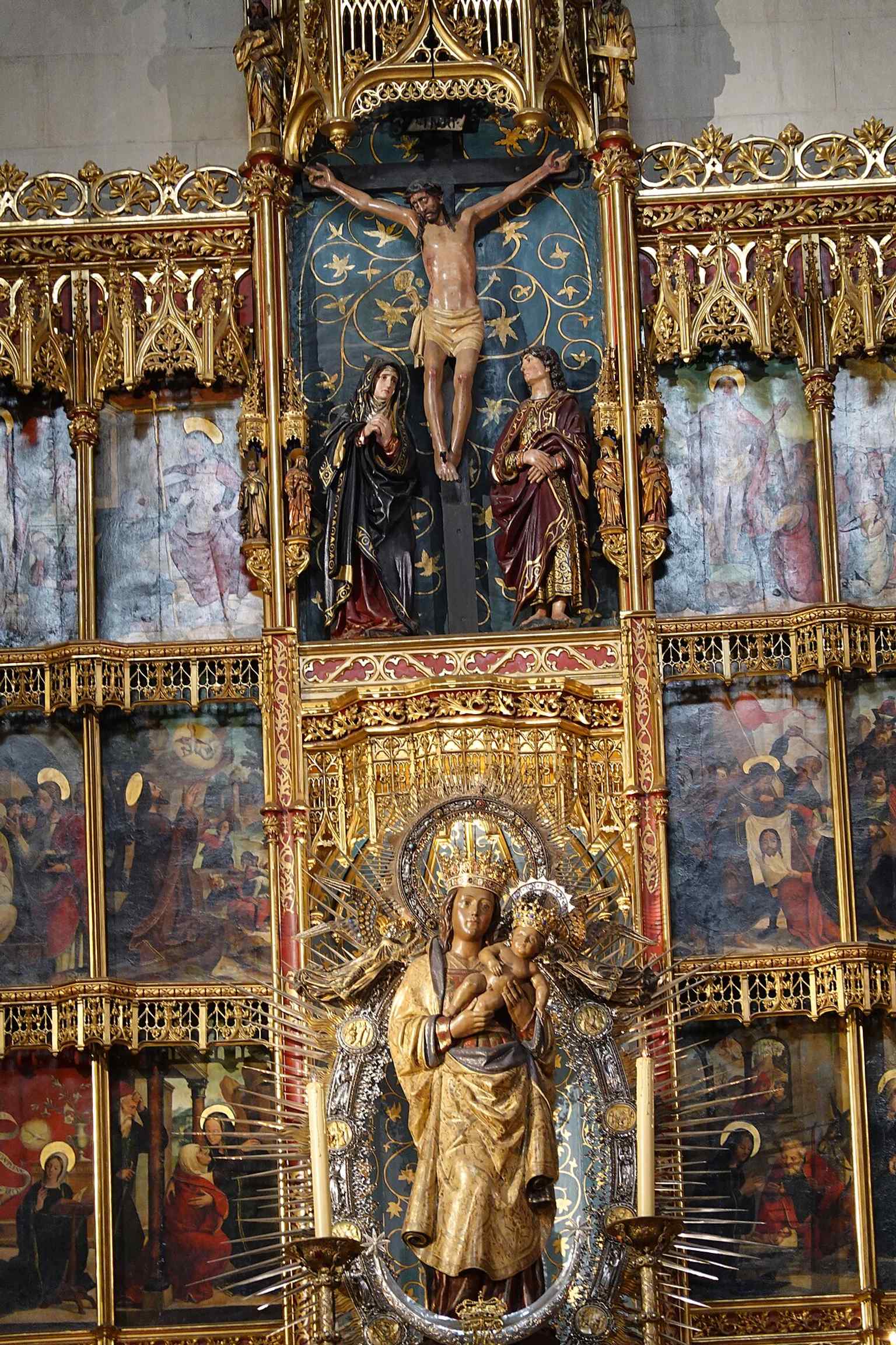 The altarpiece of the Chapel of Our Lady of Almudena, centered on the cathedral’s patron and tied to the city’s founding devotion.