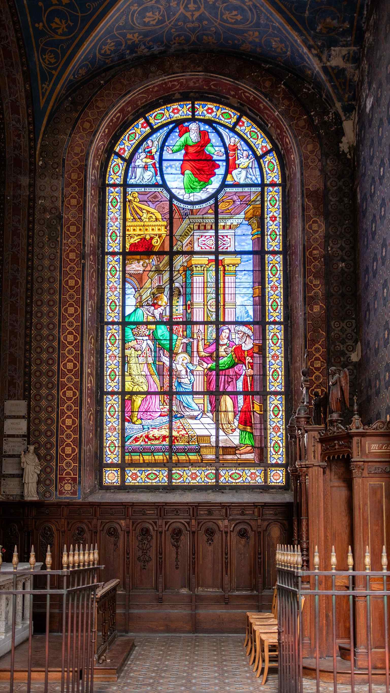 A larger stained-glass detail that helps show the cathedral’s colorful 19th- and 21st-century glazing inside the otherwise austere building.
