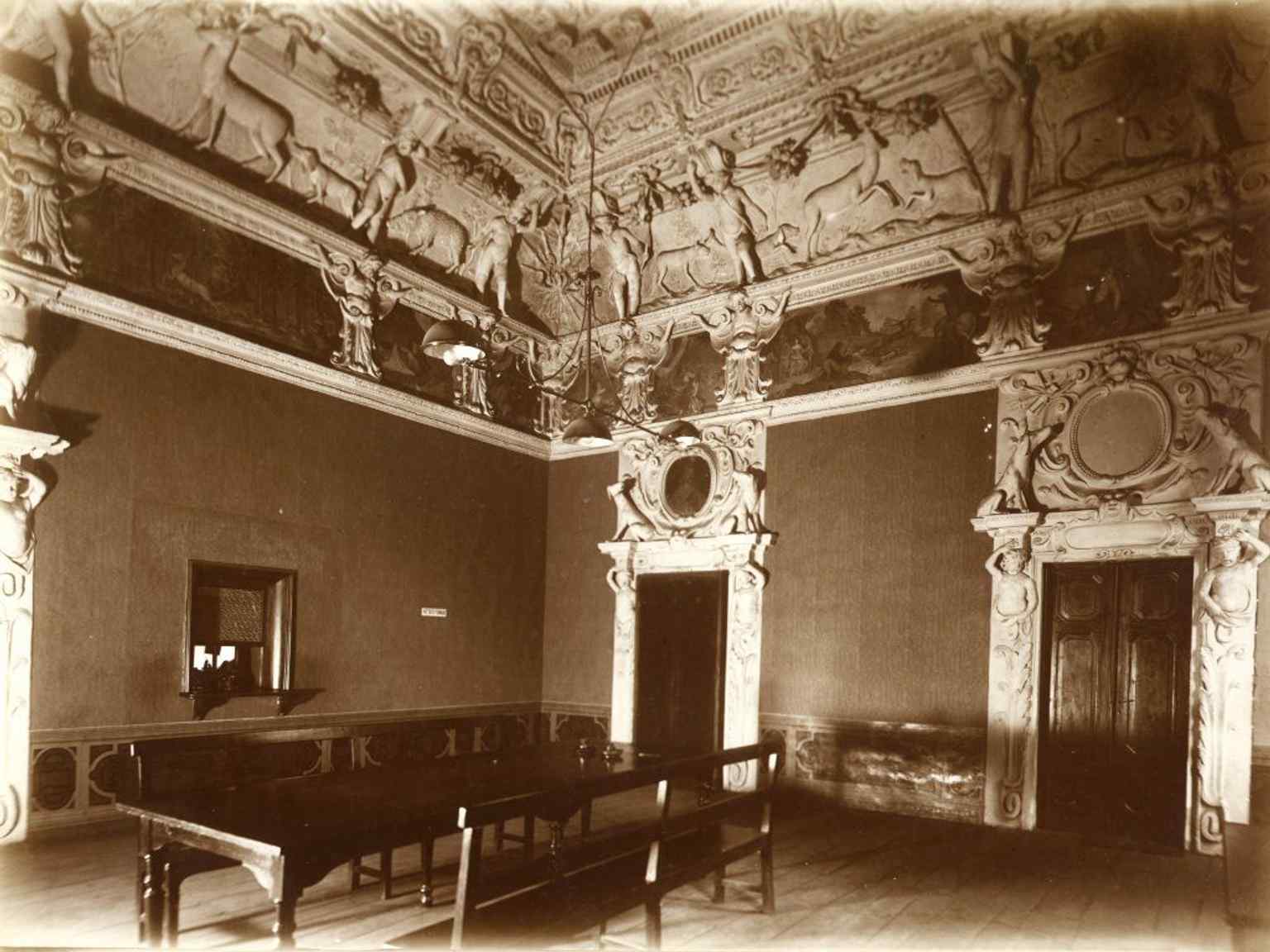 The opulent Hunting Room on the noble floor, photographed in 1926, reflecting the elegant interior halls that evolved through the centuries.