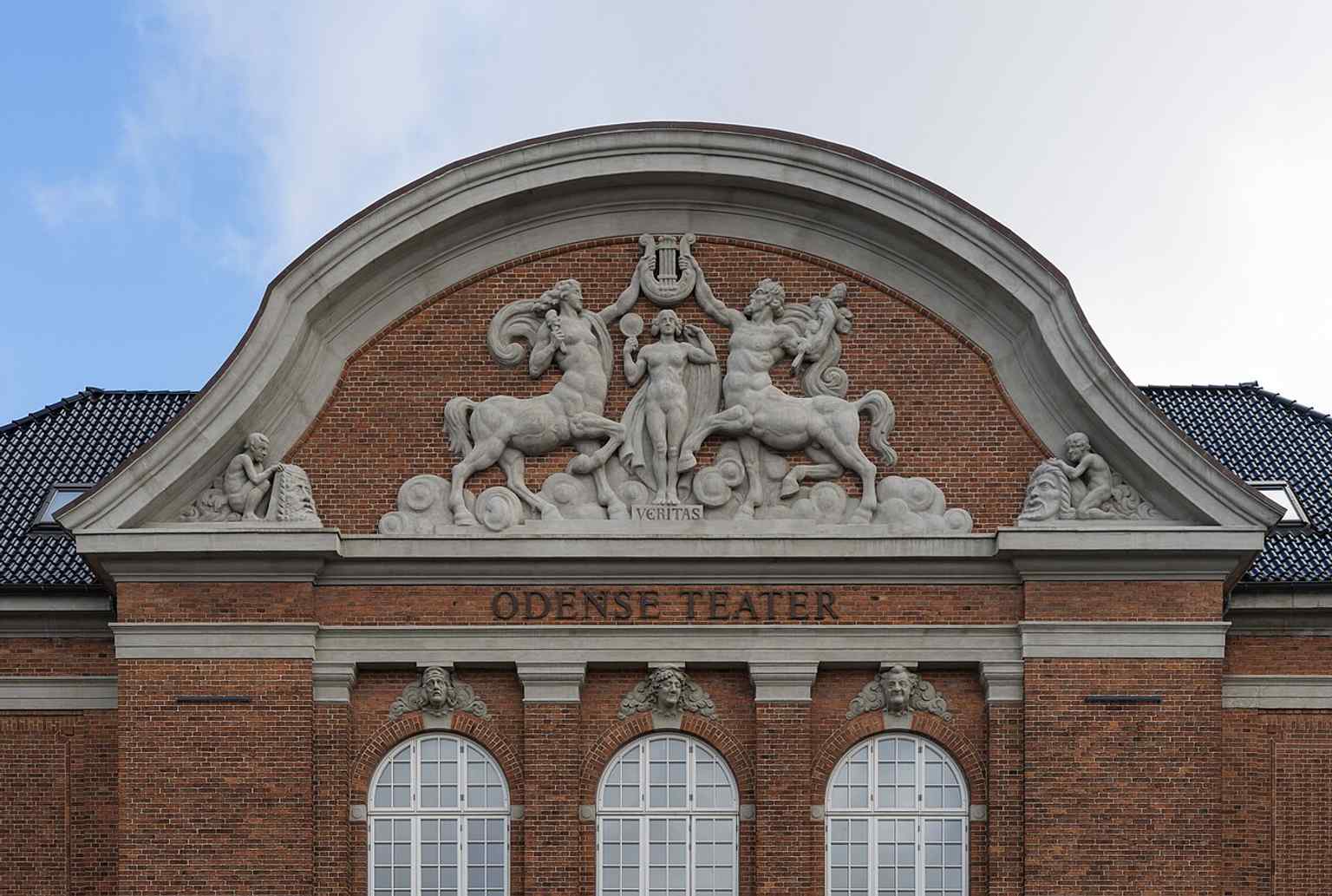 The pediment detail on the theatre façade, part of the New Baroque building designed by Niels Jacobsen when the company moved here in 1914.